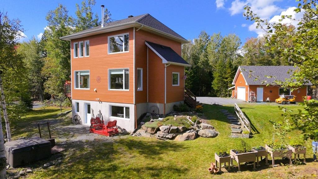 House by the water in a magical setting